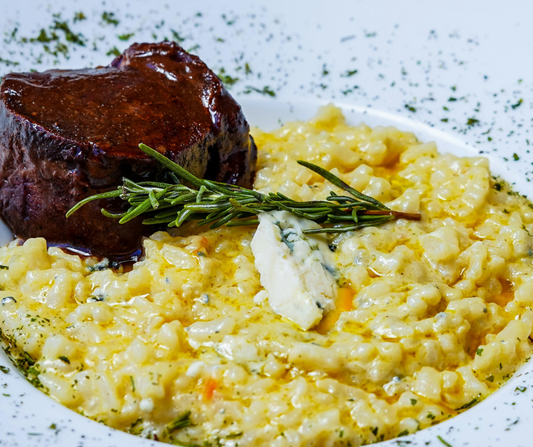 Ostrich and Wild Mushroom Risotto with Thyme Butter