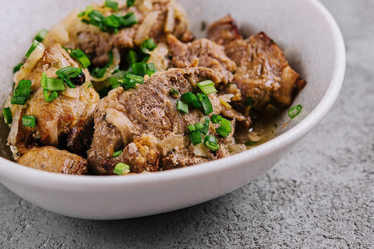 Cider-Braised Ostrich Tri-Tip With Caramelized Onions